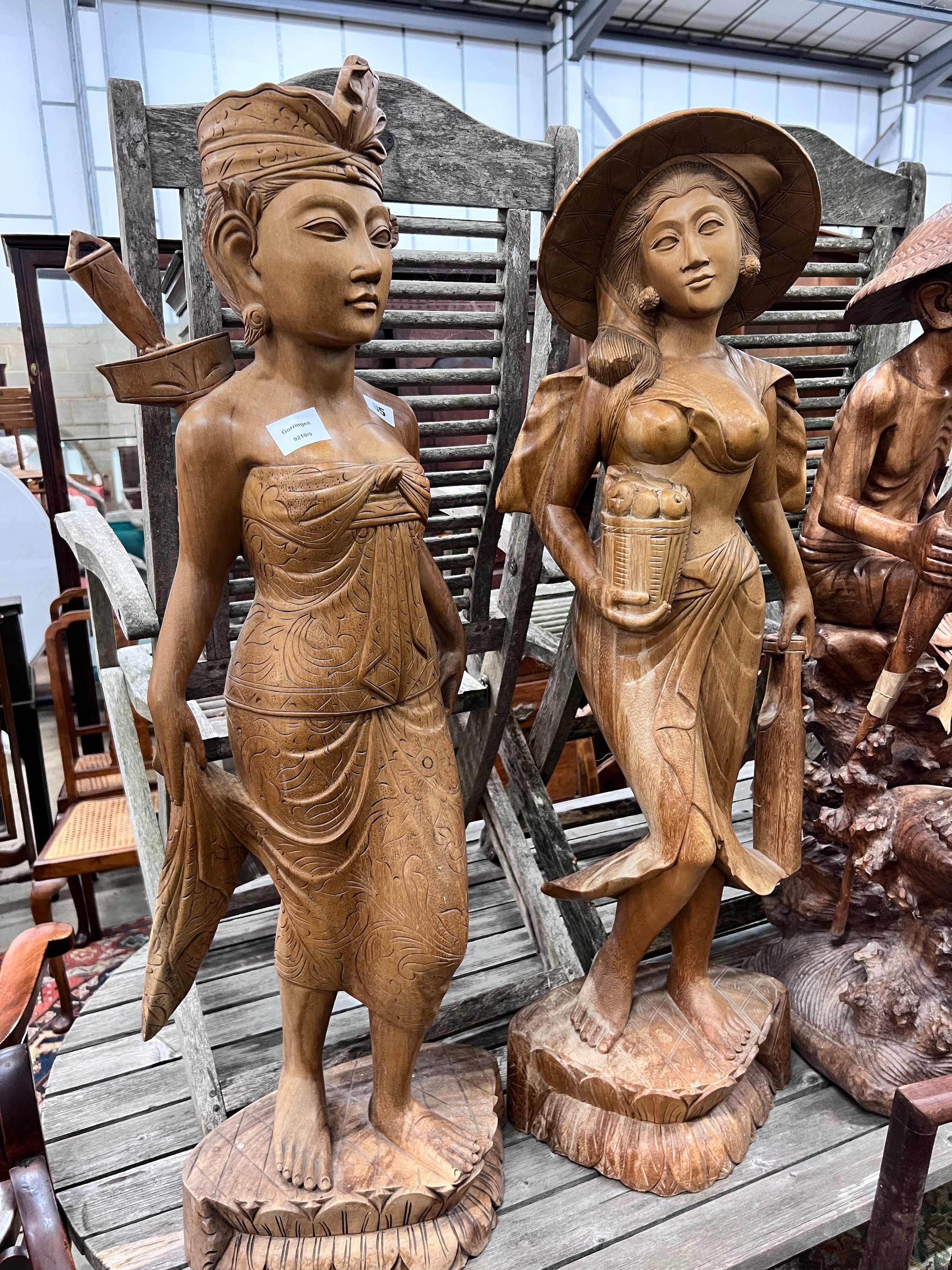 Six Balinese carved hardwood figures, largest height 104cm *Please note the sale commences at 9am.